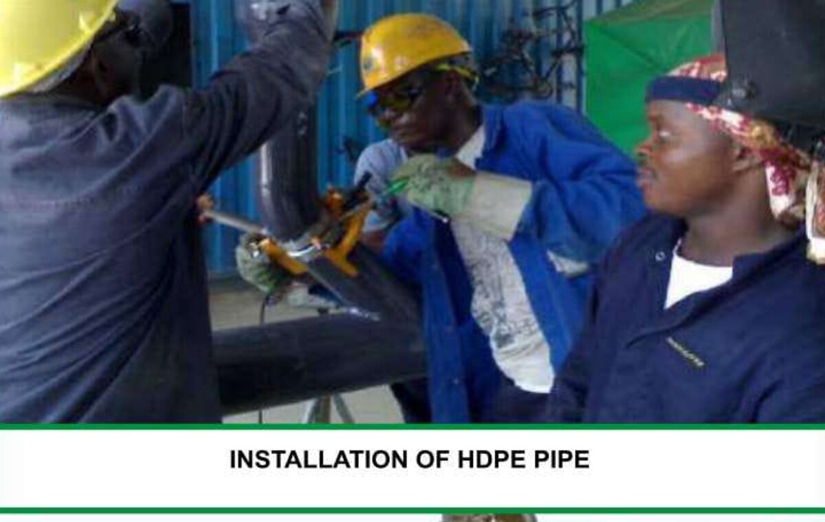 Someni team carrying out project work in the field